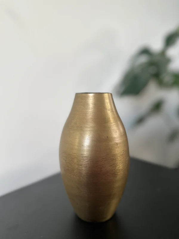 Set gouden vaas en decoratietak